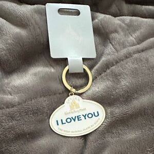 Gold and White Keychain with 'I Love You' Message